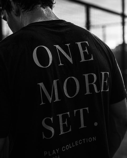 AP Club One More Set Tee (Play Collection No.004) – back view of black t-shirt with 'ONE MORE SET' graphic, British padel apparel.