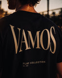 AP Club Vamos Tee (Play Collection No.001) – close-up back view of black t-shirt with gold 'VAMOS' graphic, British padel apparel.